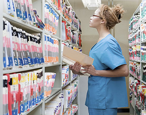 Hospital orderly in archives