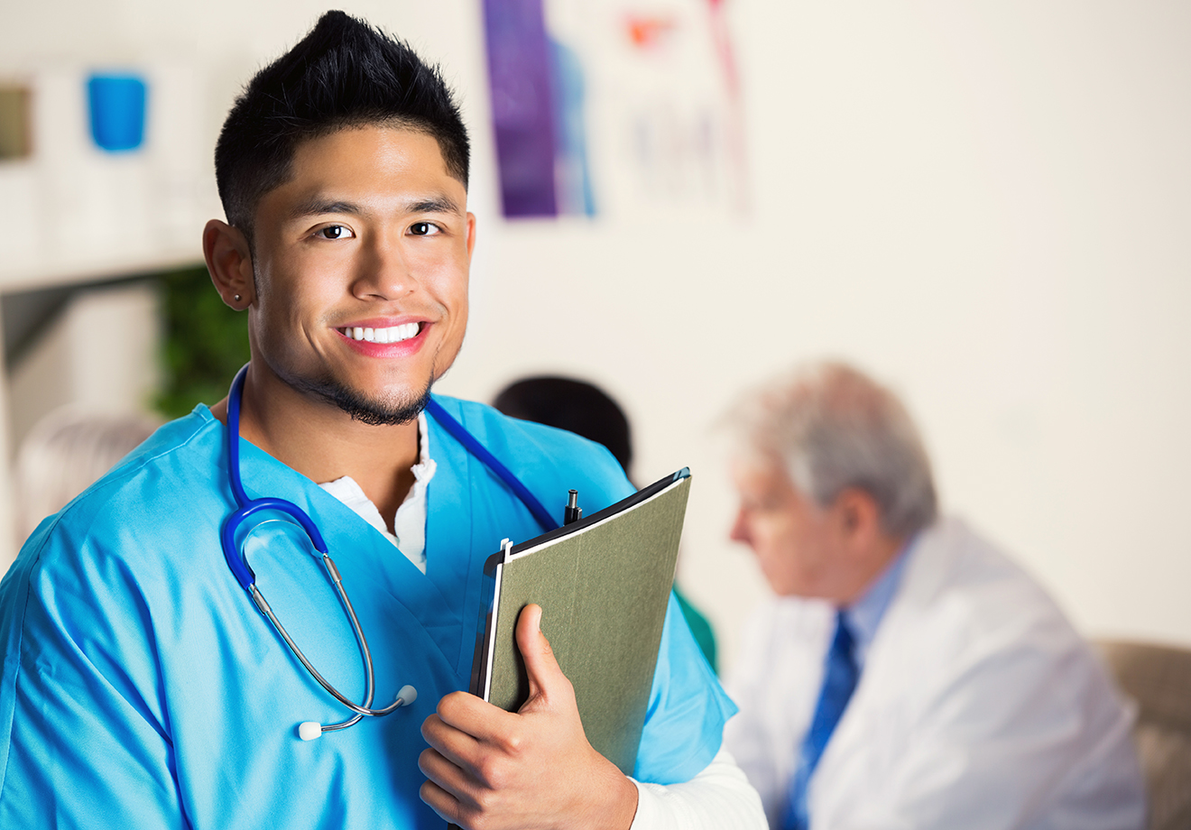 Young adult Asian male nurse or doctor in hospital meeting