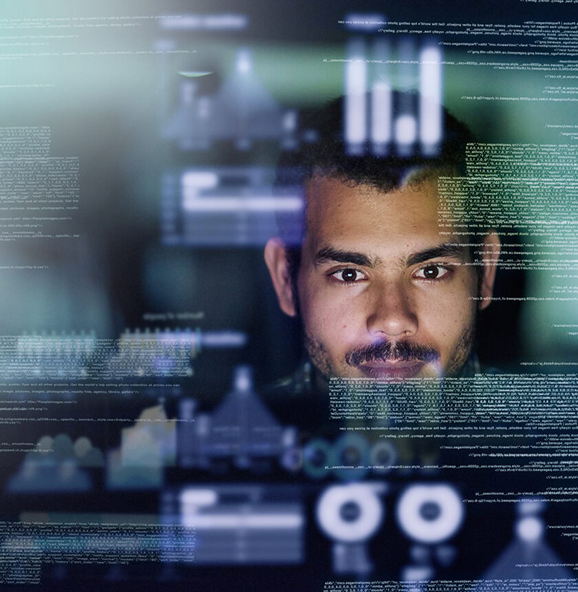 Cropped shot of a young computer programmer looking through data