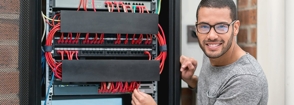 IT technician fixing intranet at the office