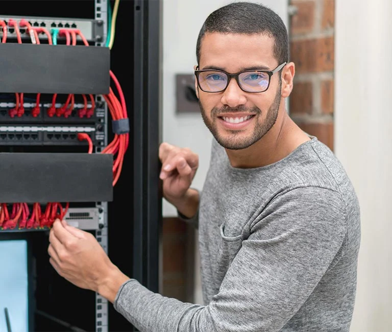 IT technician fixing intranet at the office
