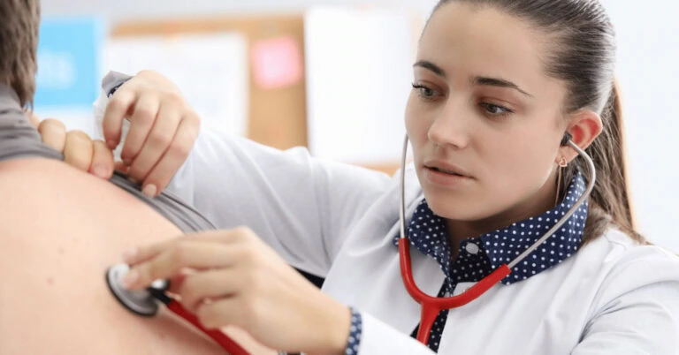 Women treating a patient