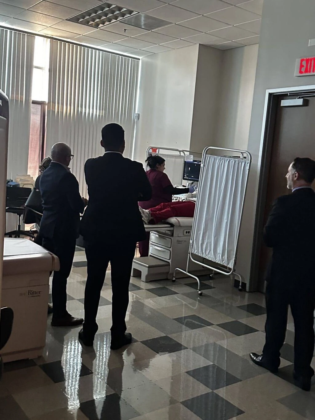 Sonography students perform an ultrasound scan in the Platt College Riverside lab.
